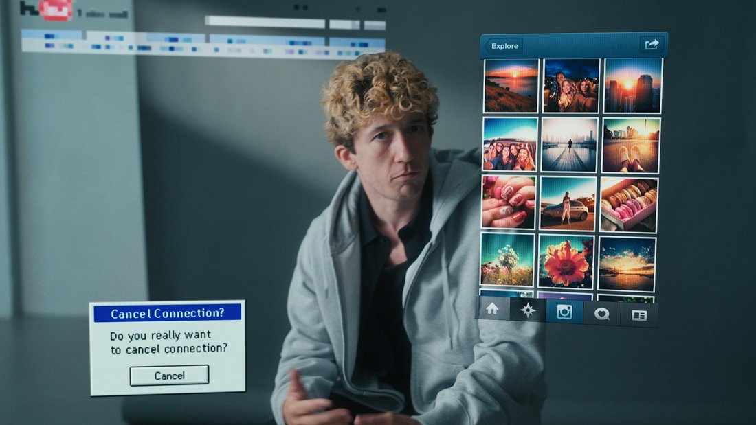 A guy looking at pictures of a girl on his phone with a popup asking him: "Do you really want to cancel connection?"