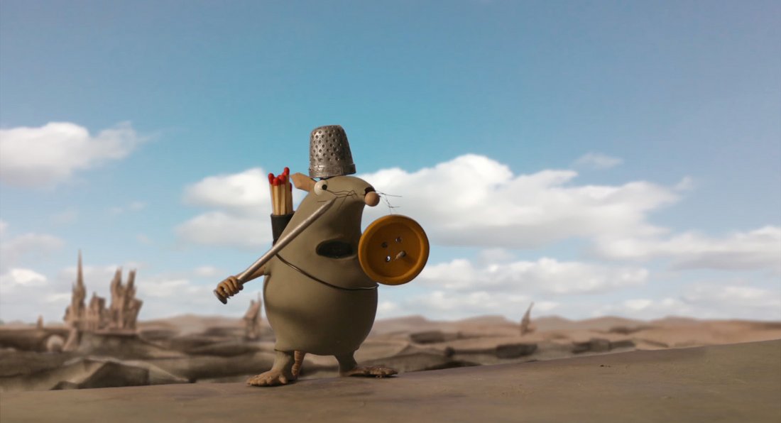 Prince Rat - Still - An armoured rat made from clay wielding a needle as sword and button as shield in a desert environment.