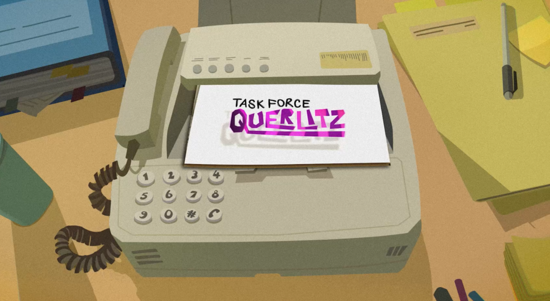 A fax machine with a print out of the series Title "Task Force Querlitz"