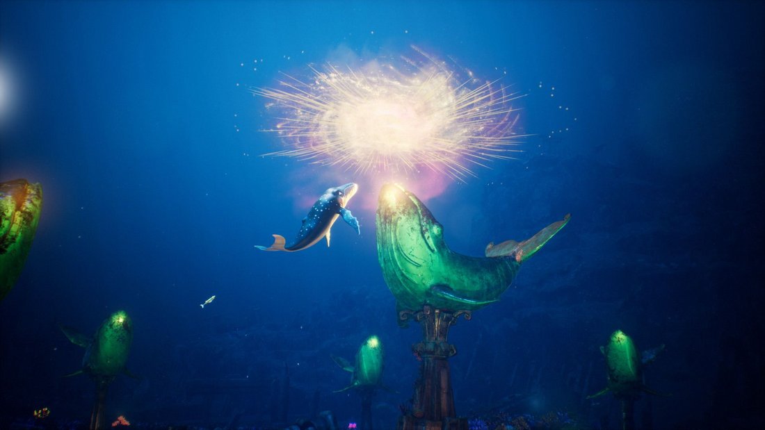 The Whale Singer - Still - A blue whale looking up at a mysterious sparkling light in front of a big green whale statue underwater.