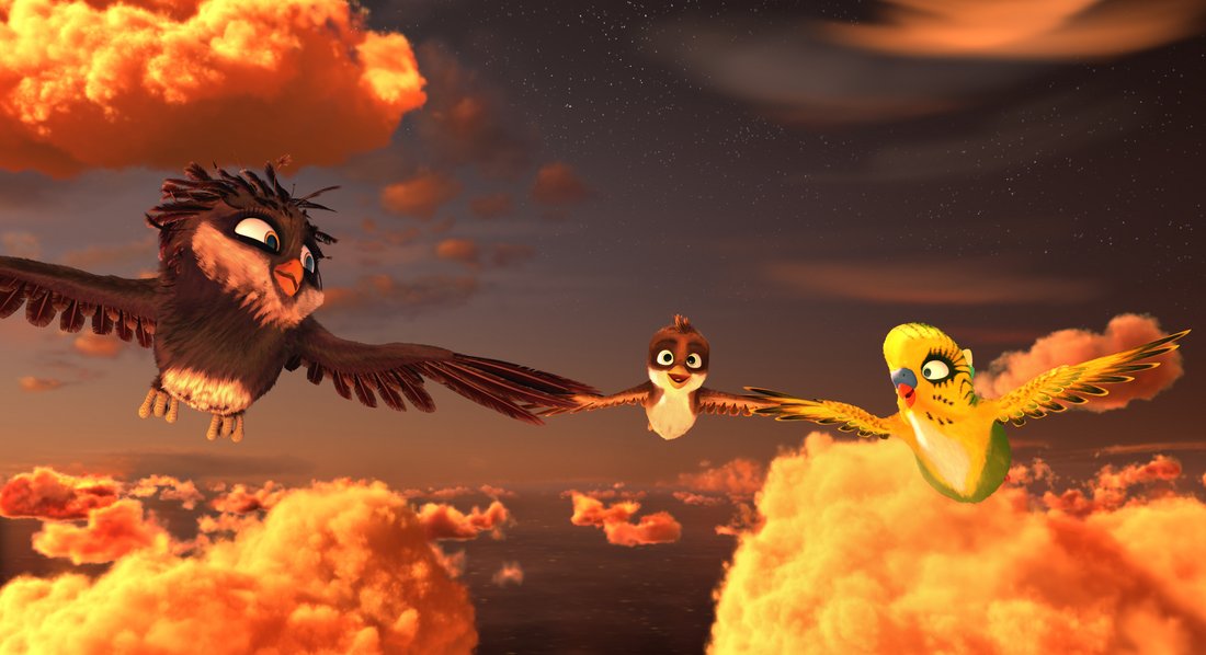 Richard the Stork 1 - Still - A sparrow gliding through air with an owl and a parrot at his side.