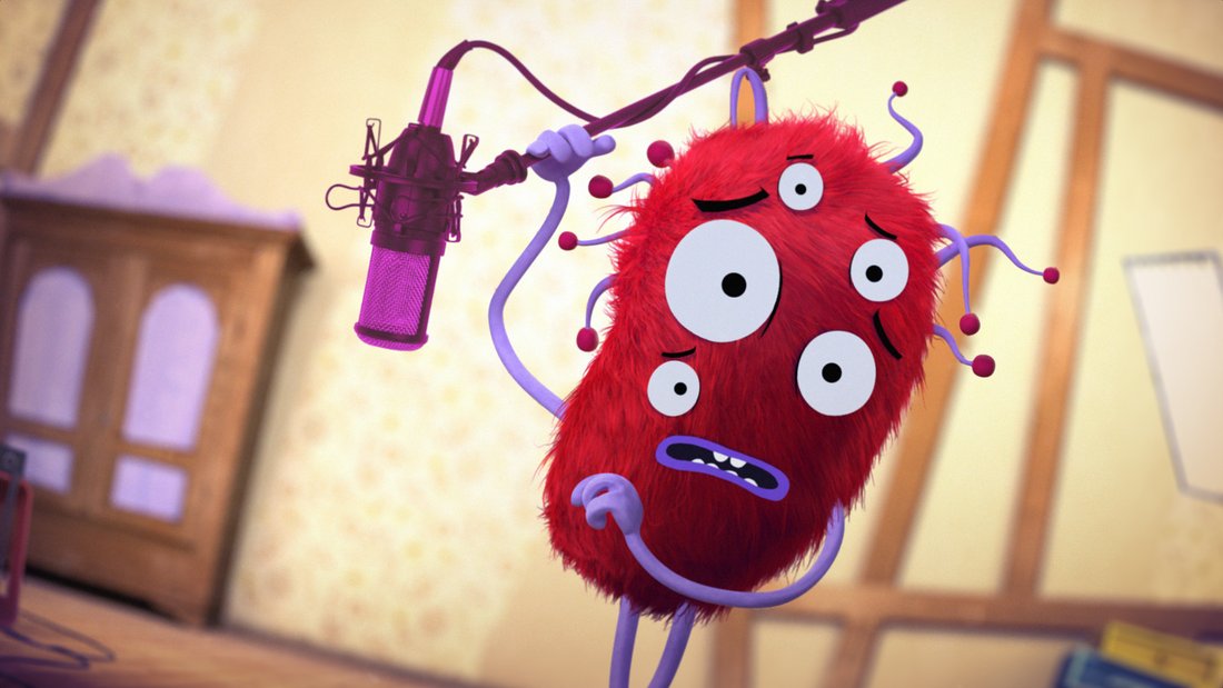 A red fluffy being with five eyes is holding a pink microphone, fearing to give a speech
